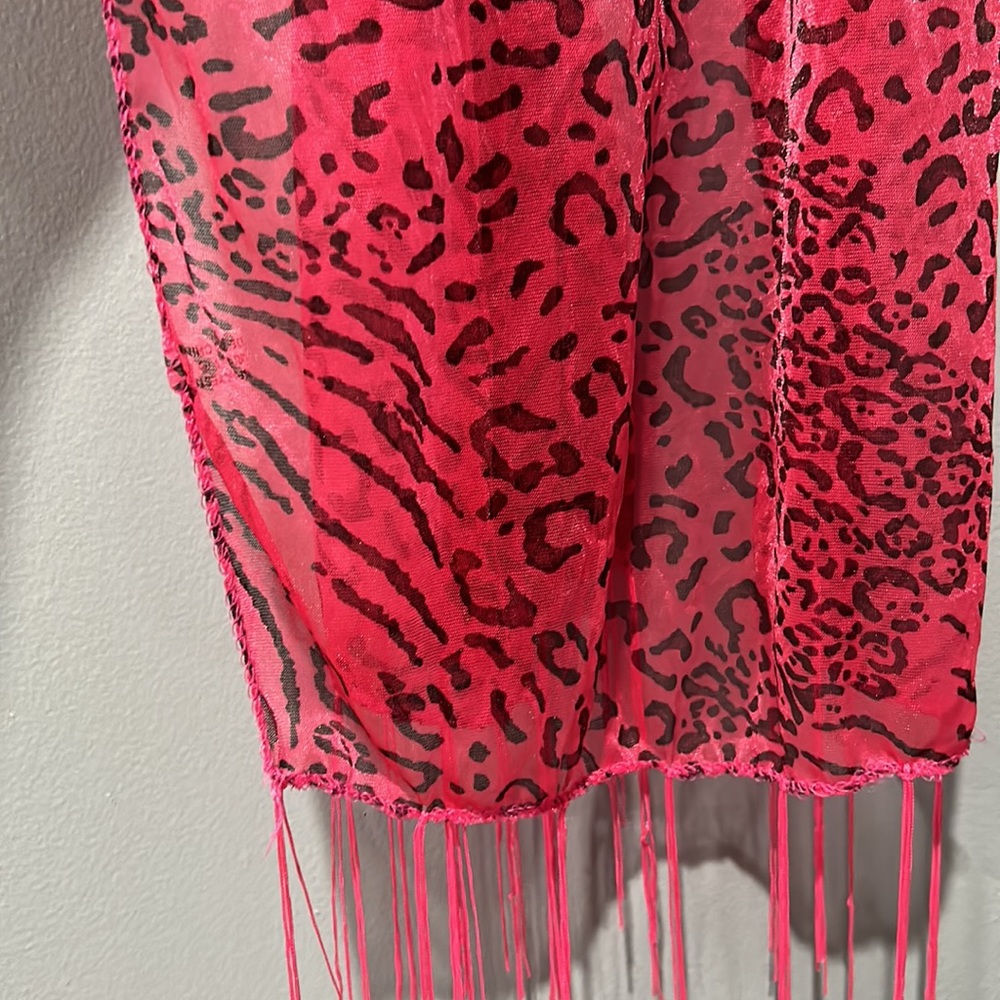 Pink sheer lightweight animal print scarf with fringe trim. 100% Polyester. NWT